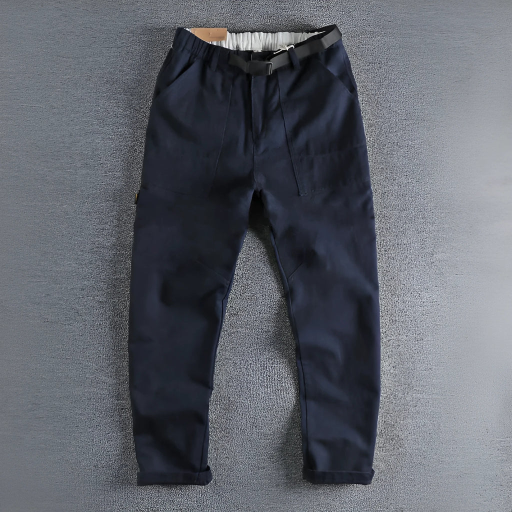 Cotton work trousers with N I buckle belt in khaki or dark blue colours showing three-dimensional cutting design
