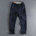 Cotton work trousers with N I buckle belt in khaki or dark blue colours showing three-dimensional cutting design