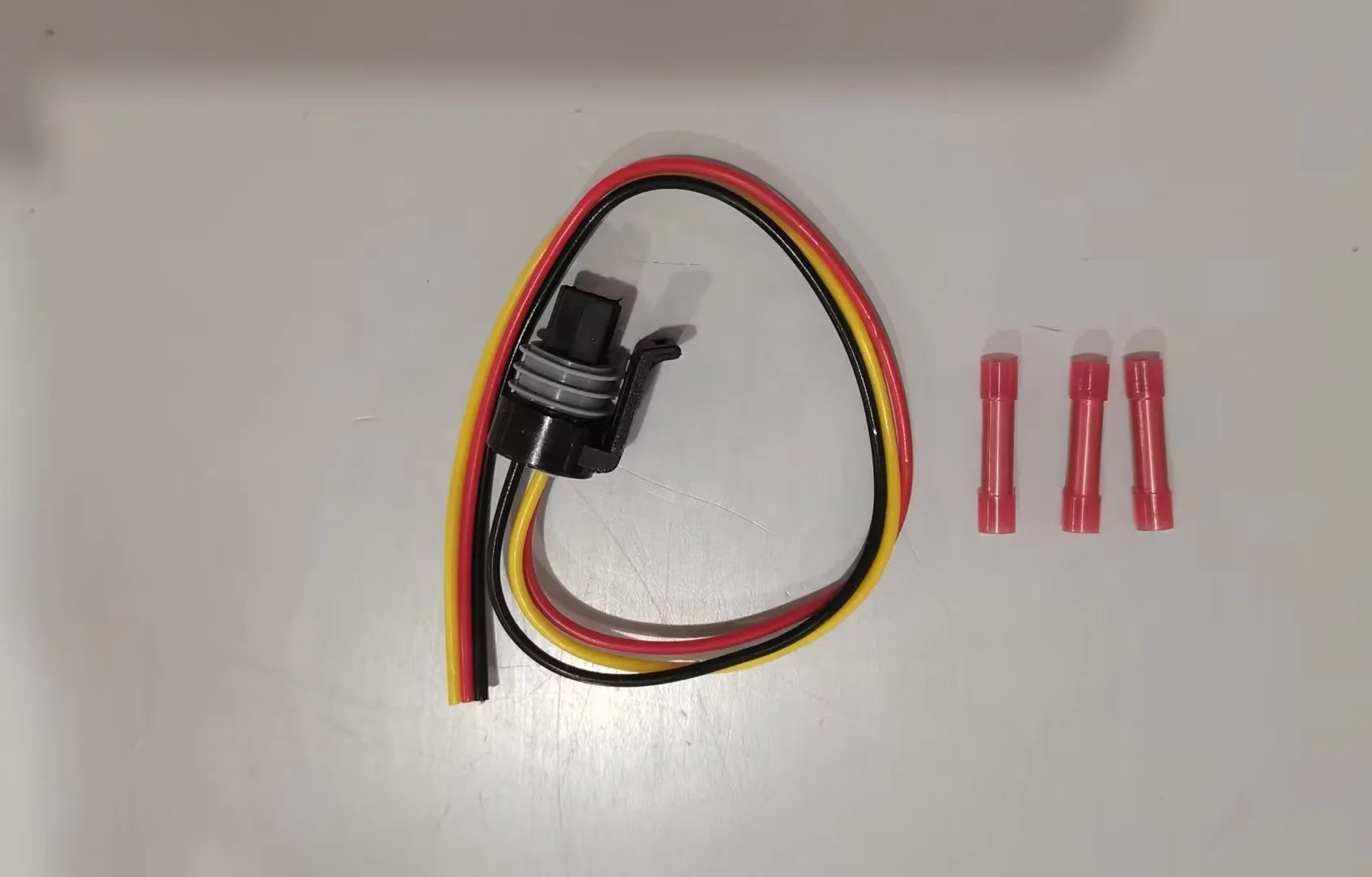 Ford F6TZ-9F838-A pressure sensor with attached connecting line on a white background