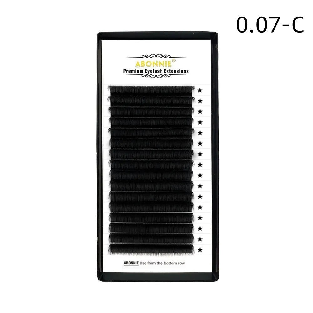 Pair of dense 16-row false eyelashes made from mink hair, showing a matte finish.