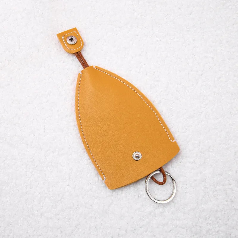 Cartoon-themed PU leather car key case with pull-out mechanism measuring 14x7.5 cm