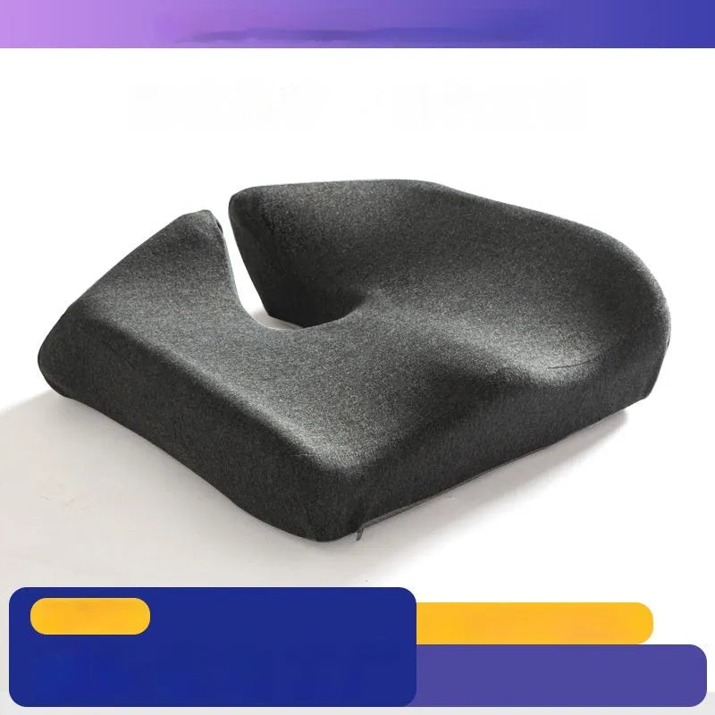 Dark grey memory foam office chair cushion measuring 36x40cm on a desk chair.