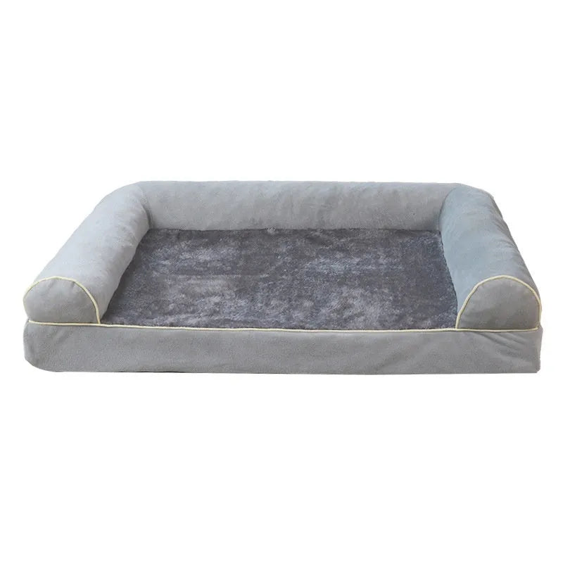 Square dog bed with sponge filling shown in blue colour with dog resting