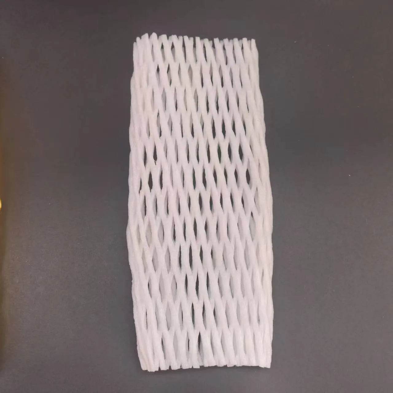 White foam net fruit protective cover shown in various sizes for packing.