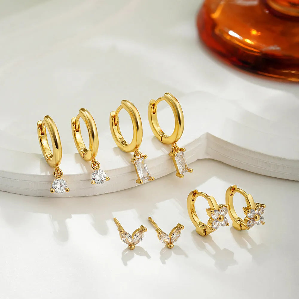 Four geometric copper earrings with zircon stones in gold or silver electroplated finish