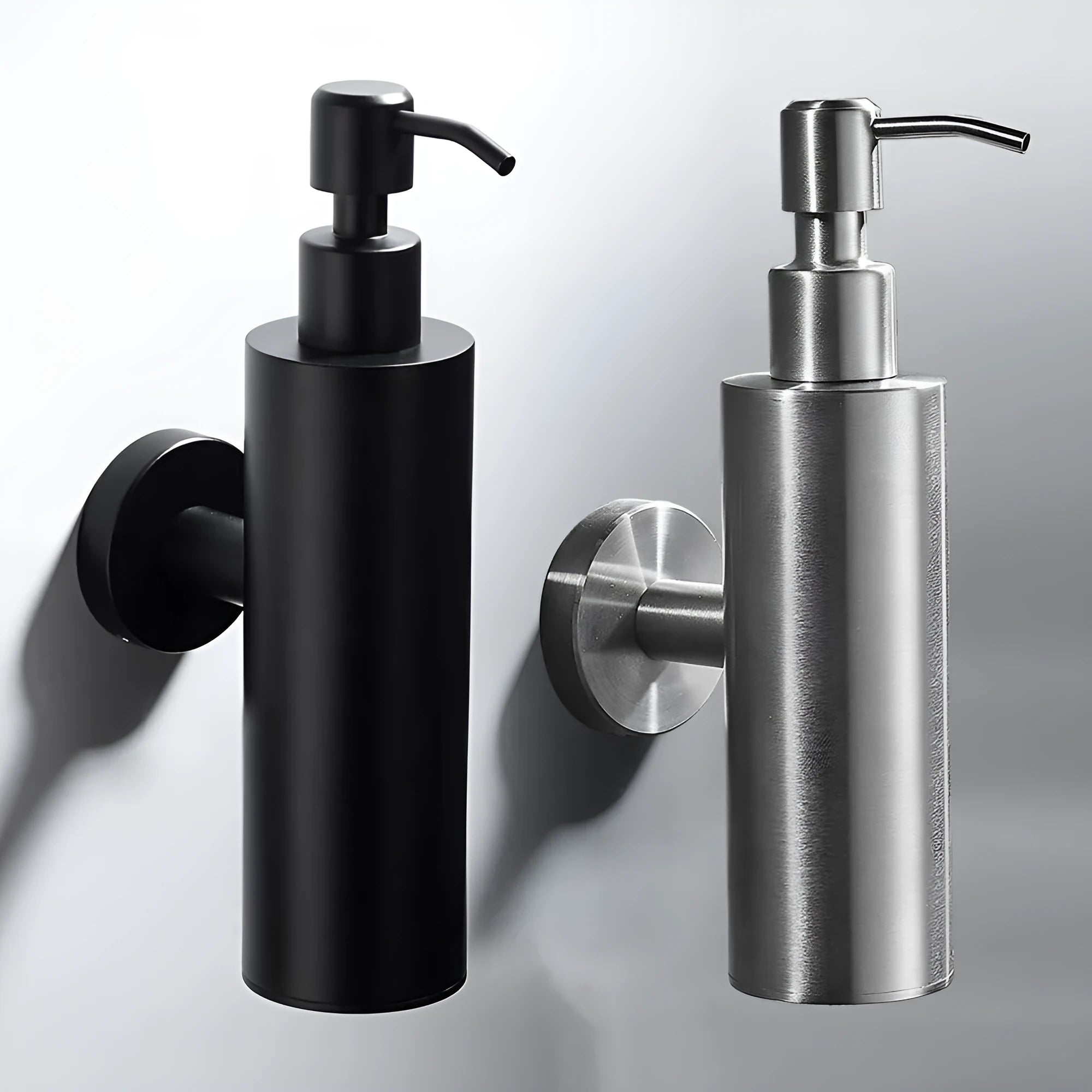 Stainless steel wall-mounted manual soap dispenser in brushed, mirror, or black finish