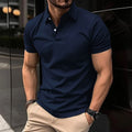 Men's solid colour short sleeve polo shirt with button lapel collar on a regular fit.