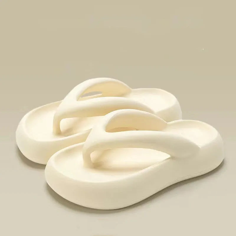 Solid colour EVA flip-flops with thick sole and decorative bow.