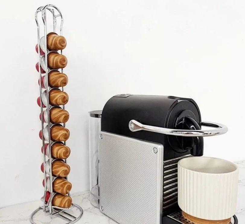 Black wrought iron coffee capsule storage rack holding 20 capsules on two shelves
