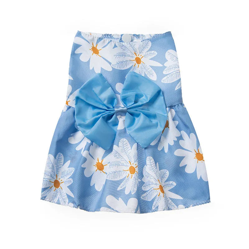 Ultra-thin floral butterfly knot pet dress for dog or cat with coloured bow, shown in blue.