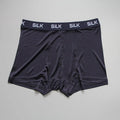 Men's casual silk shorts in navy blue, shown with a loose fit and mid waist design