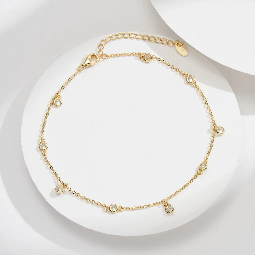 Women's silver anklet with geometric zirconium pendant on adjustable chain