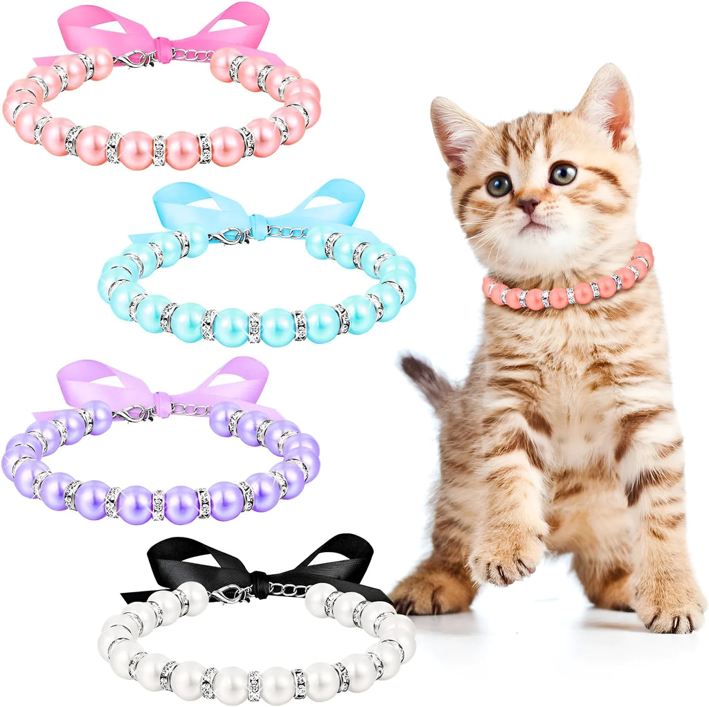 Small dog wearing adjustable pearl necklace with rhinestones and ribbon bow decorative collar
