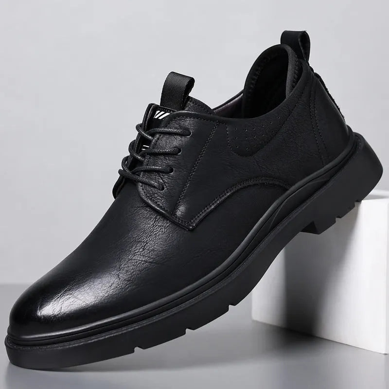 Men's black leather business shoes with rubber sole and decorative sewing lines on cowhide upper