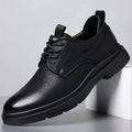 Men's black leather business shoes with rubber sole and decorative sewing lines on cowhide upper
