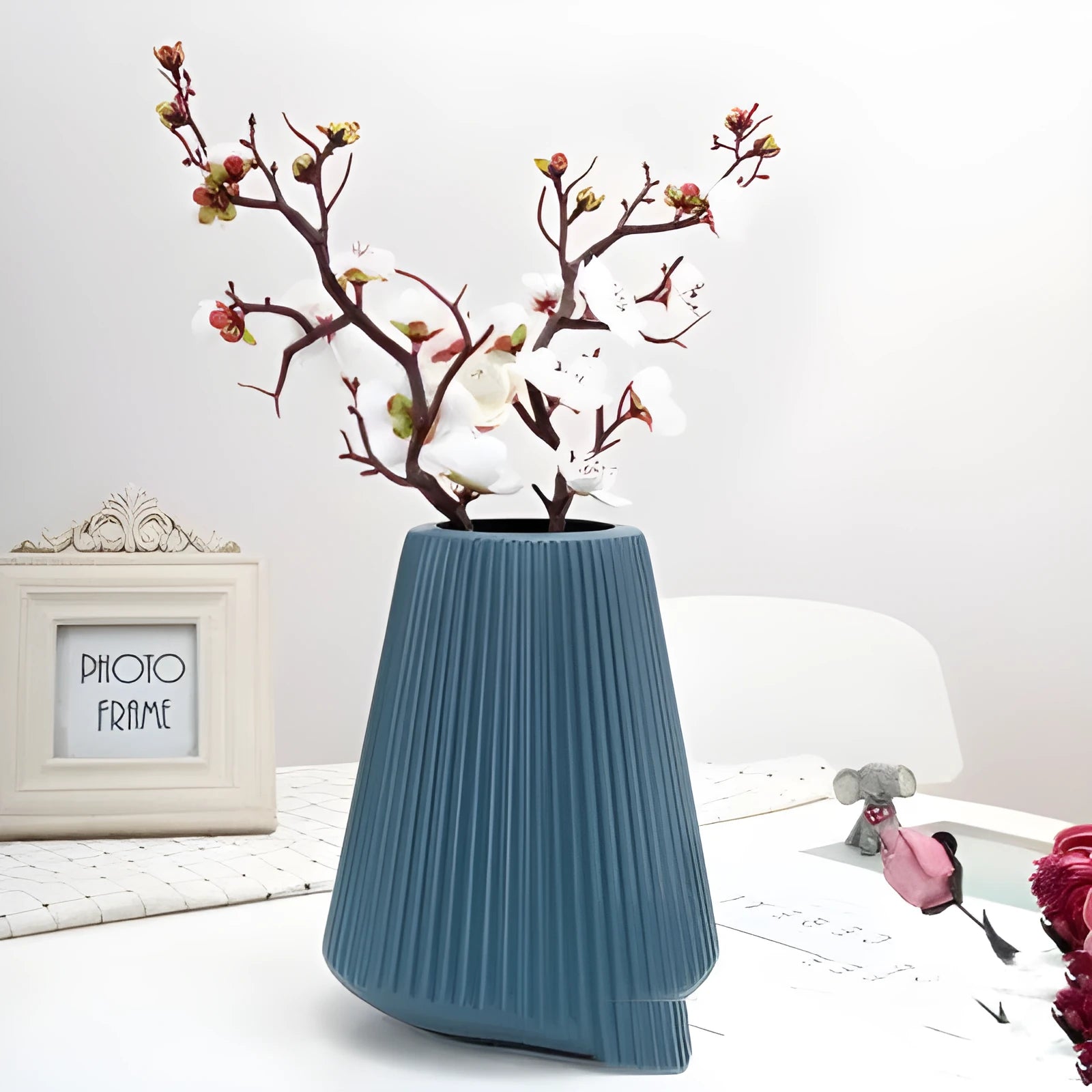 Colourful melamine plastic flower vase in blue, green, pink, or white, measuring 16 cm by 20 cm.