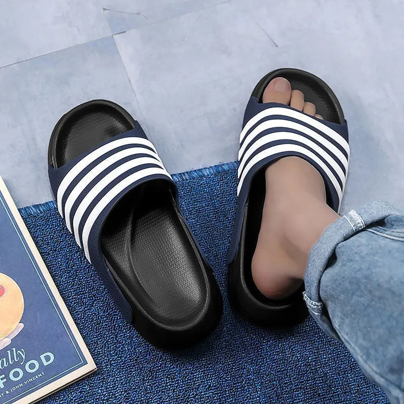 Casual unisex slippers with a light EVA sole and a structured PVC upper, shown in a neutral colour.