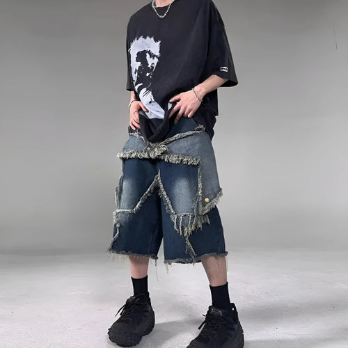 Blue denim shorts with frayed hem and star detail shown in loose fit style