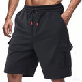Men's terry cloth cargo shorts with multiple pockets in light grey colour, showing loose fit design