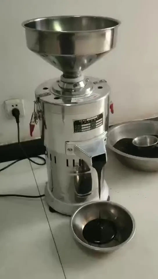 ZX-100Y electric sesame grinding machine with stainless steel construction on kitchen counter