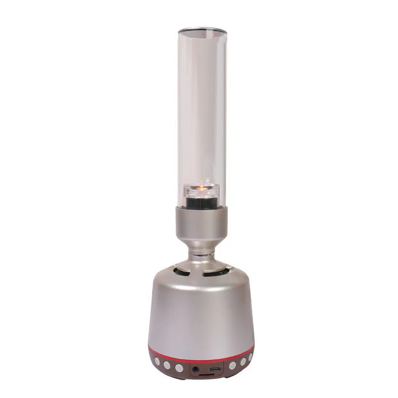 White silver Bluetooth speaker with candlelight night light feature measuring 90x277mm