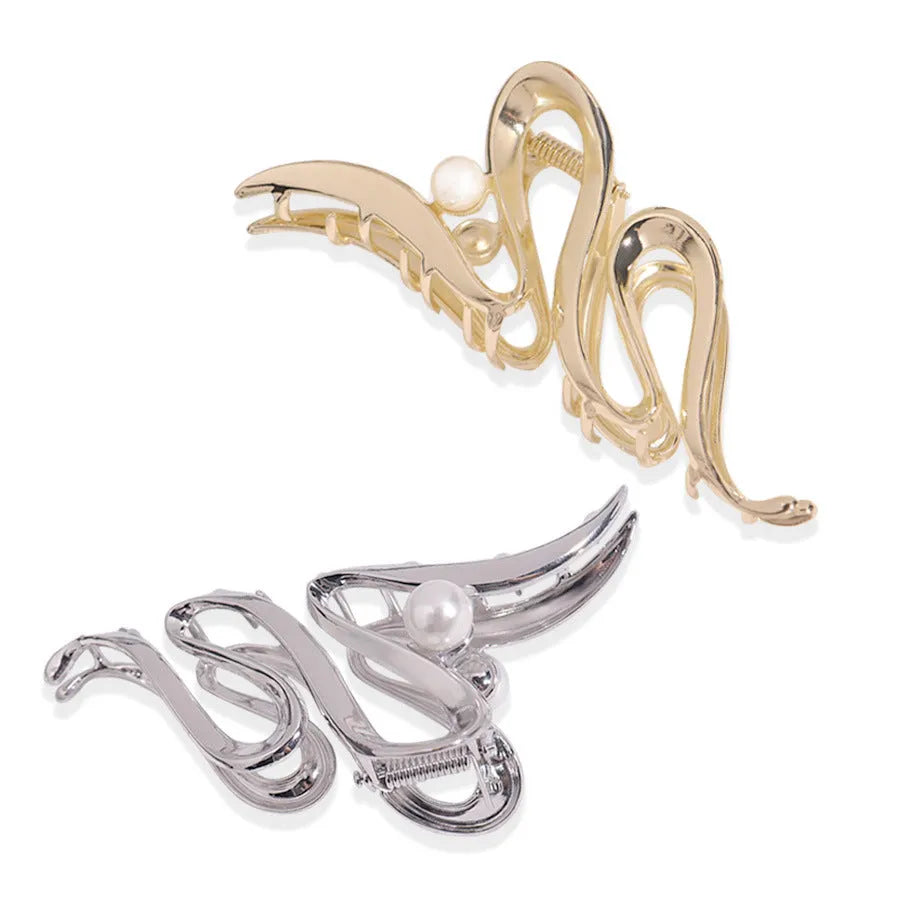 Silver metal hair claw barrettes collection showing multiple designs including wave, rose, and bow shapes
