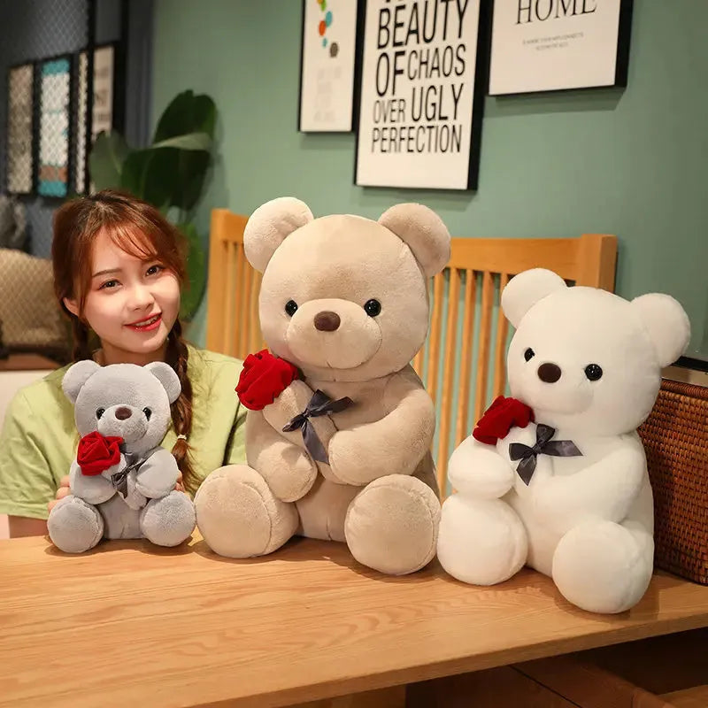 Rose bear plush teddy bear stuffed animal toy in beige, brown or grey colours showing cartoon design