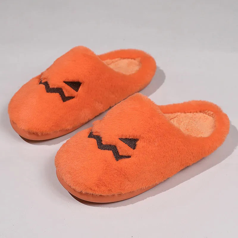 Orange Halloween pumpkin slippers with plush lining and non-slip PVC soles