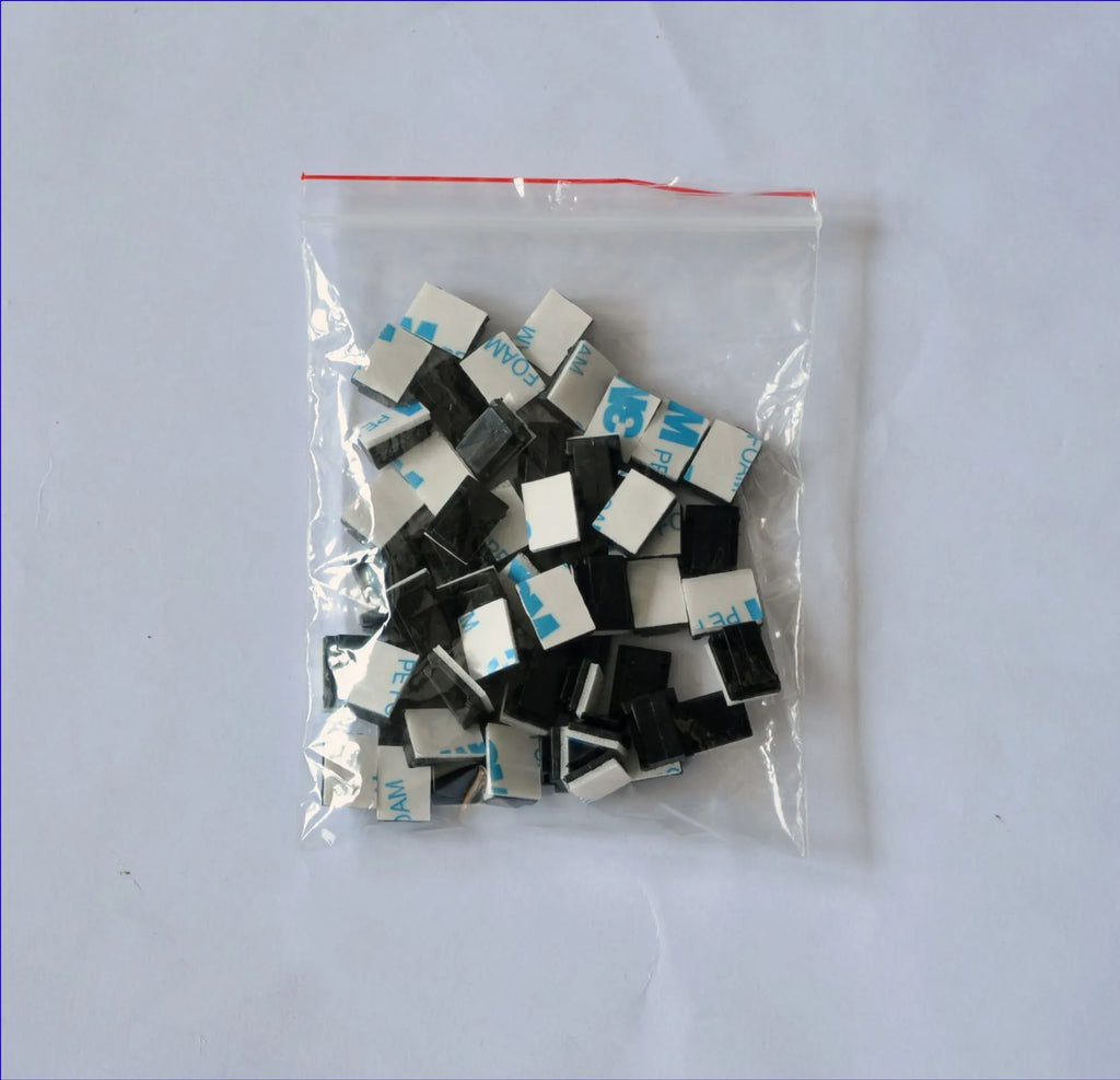 Black PA66 nylon wire management clip for automotive and electronic cable organisation