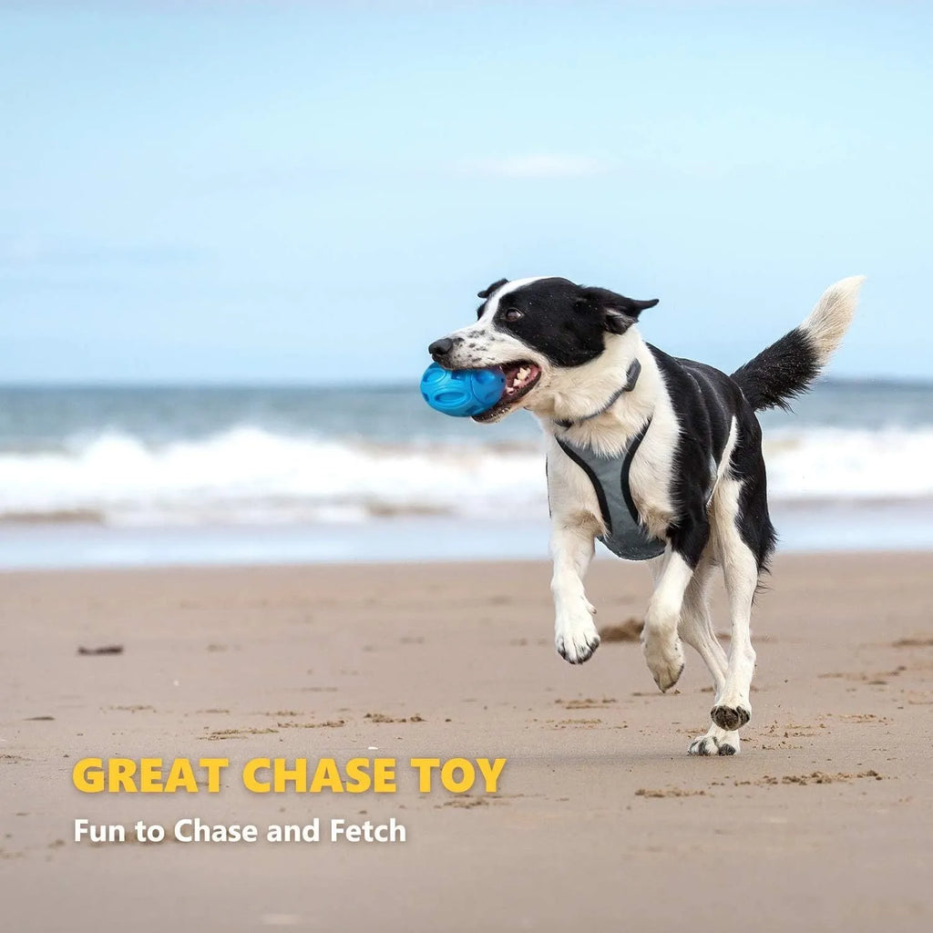 Blue durable rubber squeaky dog ball with surface grooves for aggressive chewers
