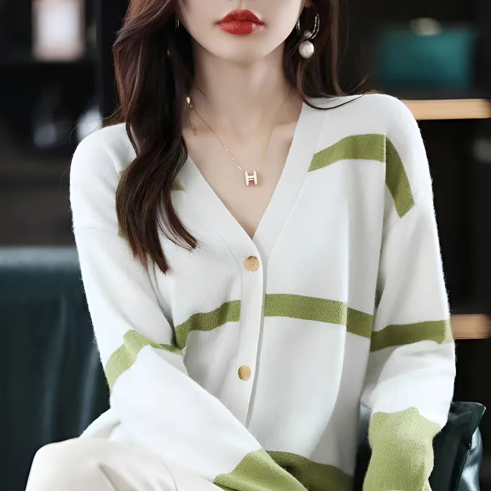 Women's slim fit striped cardigan with 3D pattern texture, V-neck, and button front closure.