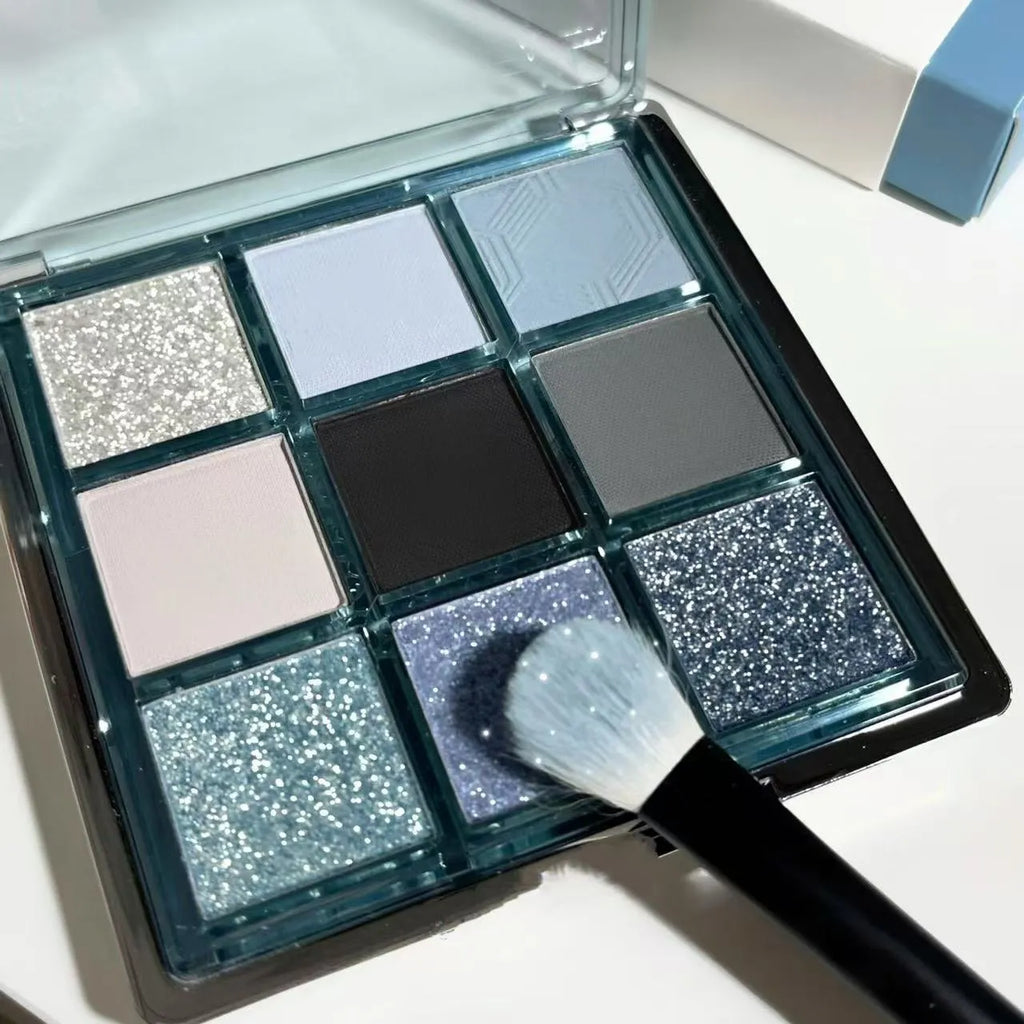 MUGELEEN nine-colour eye shadow palette 08 showing low saturation blue and earth tones with matte shimmer finishes