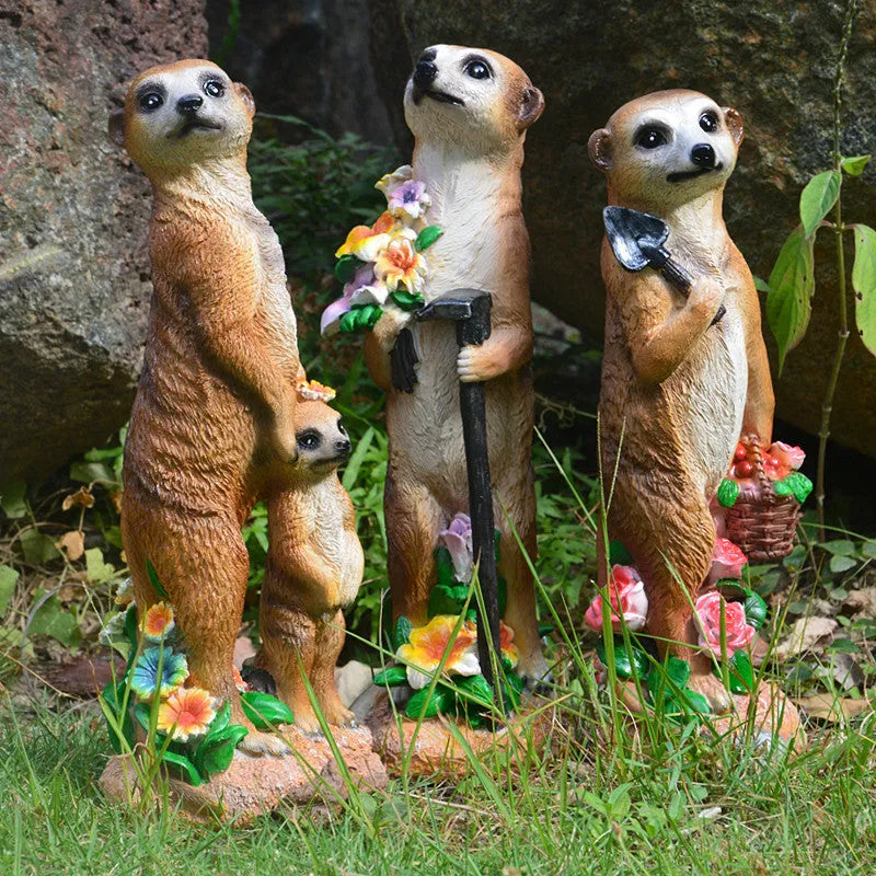 Yellow-brown resin mongoose garden ornaments with straw hats and gardening tools