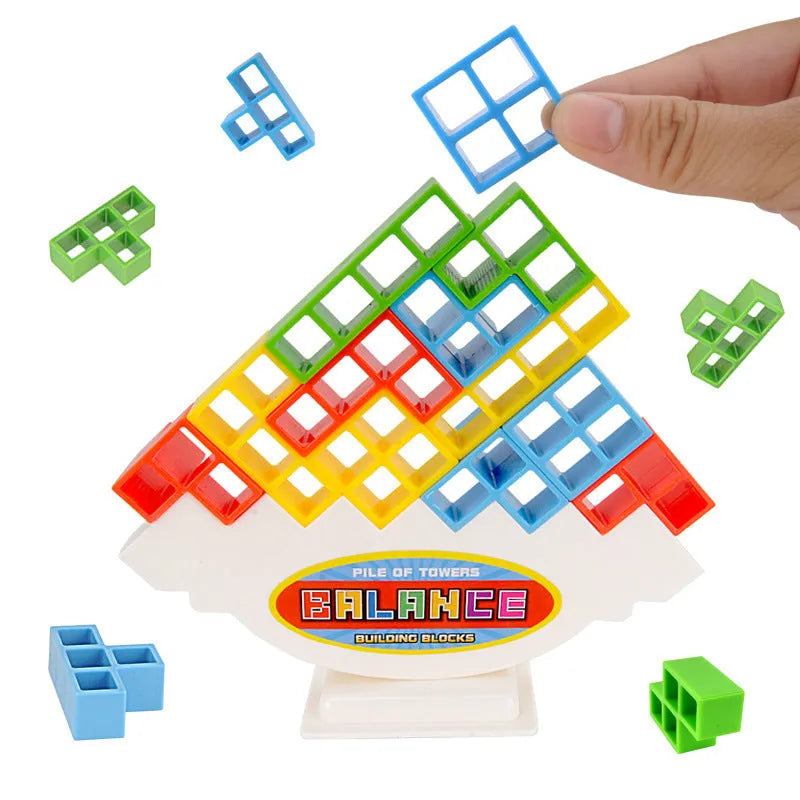 Plastic balance stacking game with 16 coloured building blocks on chassis