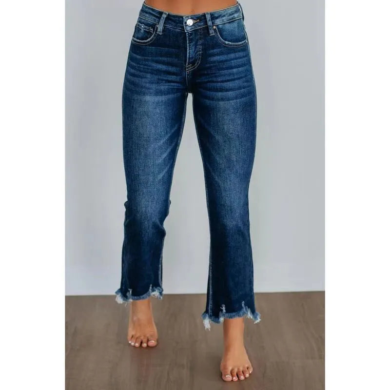 Women's solid colour denim jeans with hand-worn finish in dark blue and light blue options