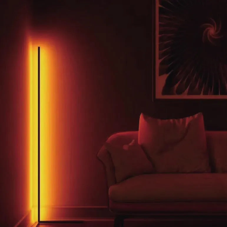 Black smart floor lamp with aluminium alloy body and silicone shade showing RGB lighting effects