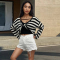 Women's striped long-sleeved sweater with exposed navel detail in mercerised cotton