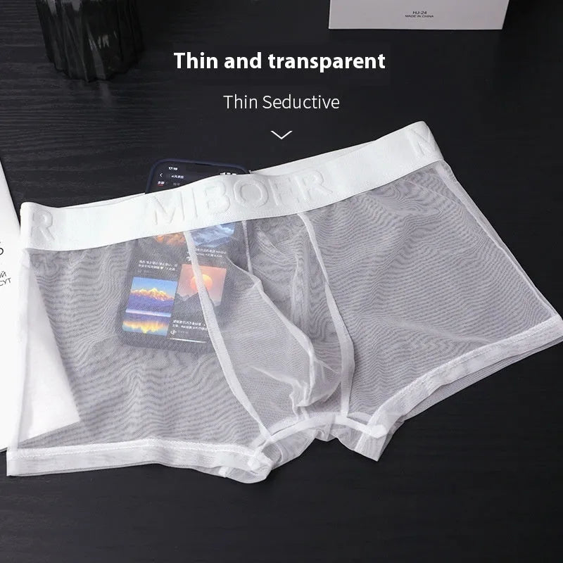 Men's thin quick-drying polyester boxer shorts in black, shown flat.