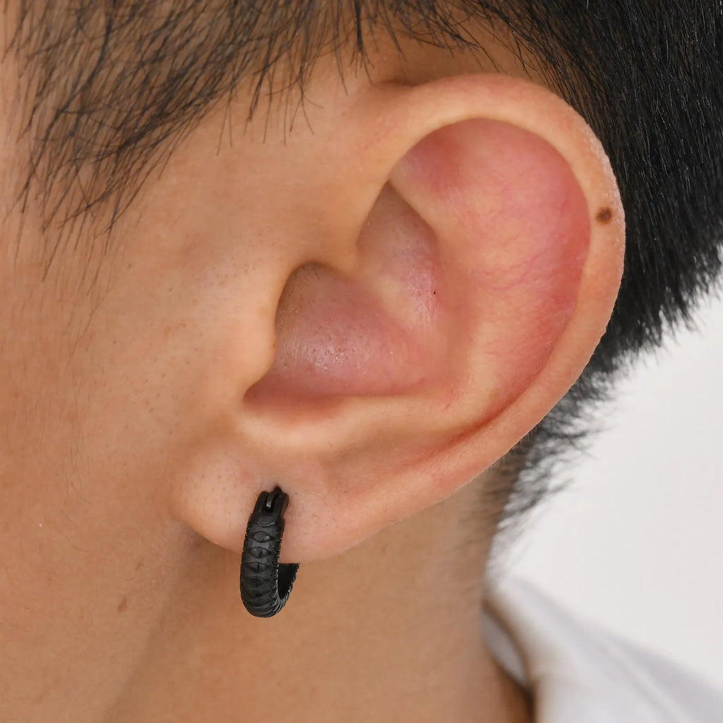 Stainless steel snake pattern stud earrings in black or gold finish