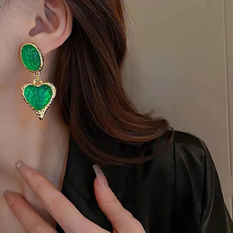 Silver needle pleated oval love heart stud earrings in green, purple, red, and yellow and white colours.