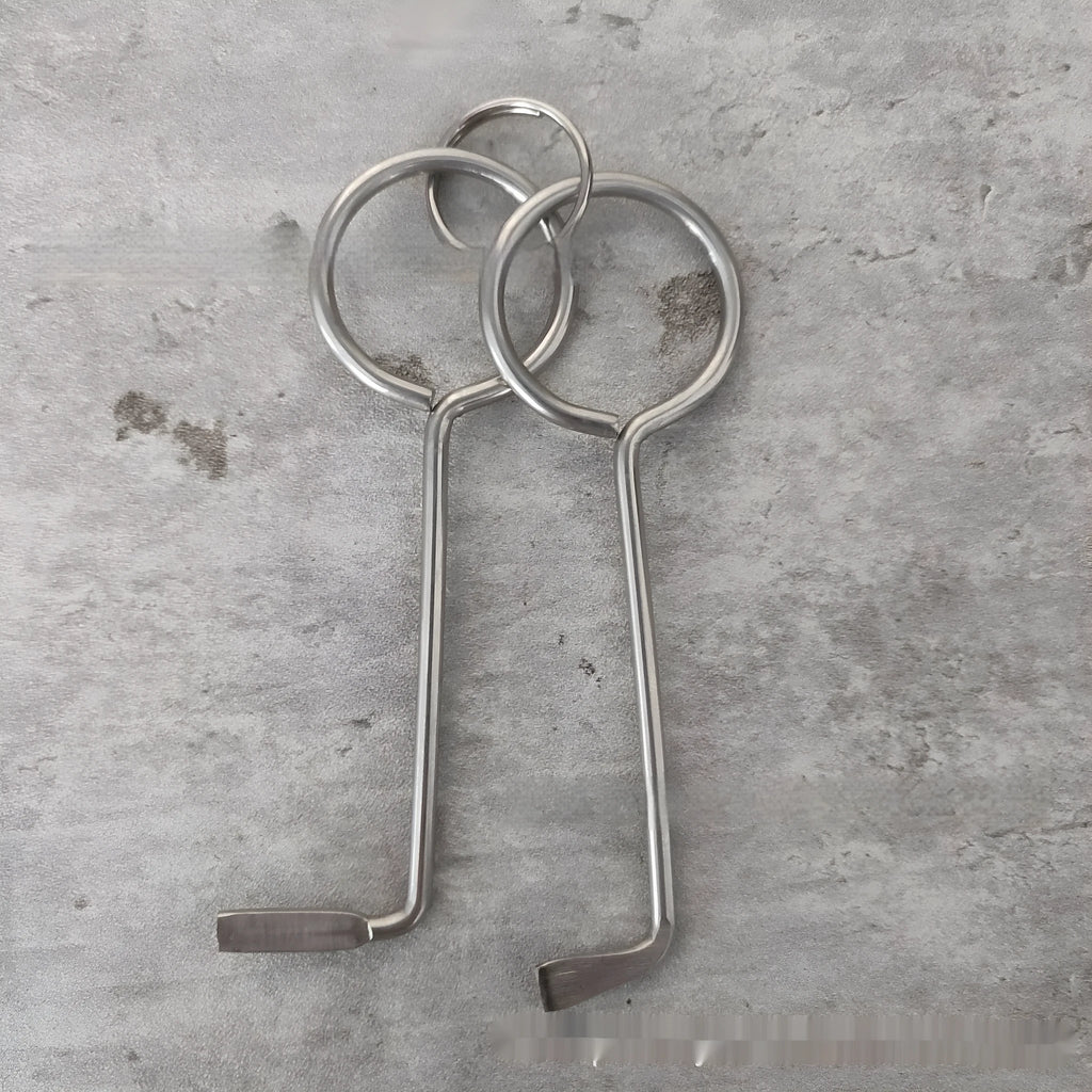 Two silver alloy wrench tools from a portable universal tool set.