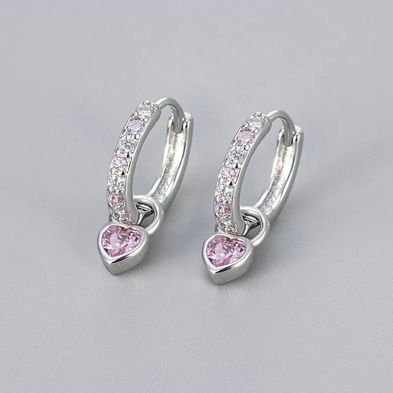 Women's fashion earrings with heart-shaped zircon eardrops in gold and white gold coloured settings