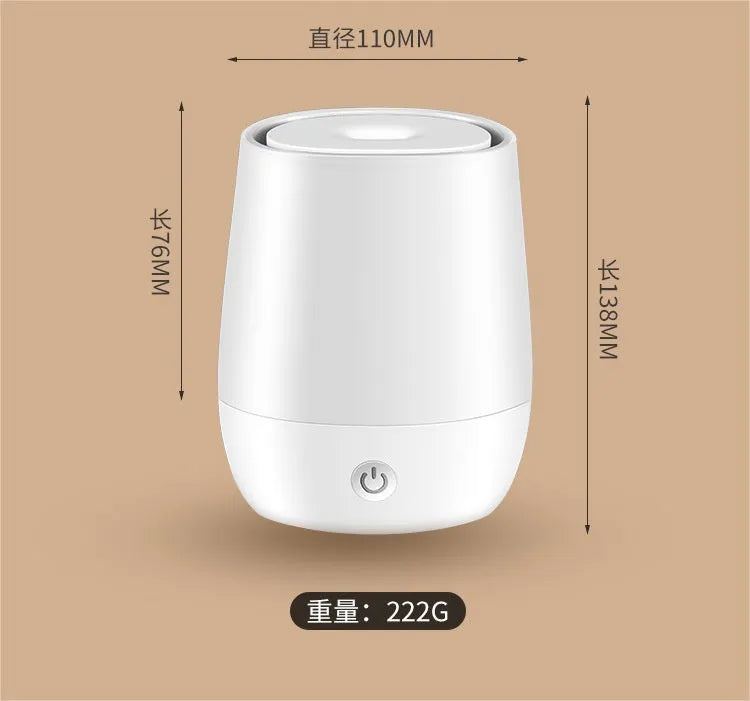 White USB aroma diffuser with simulated flame effect showing mist output