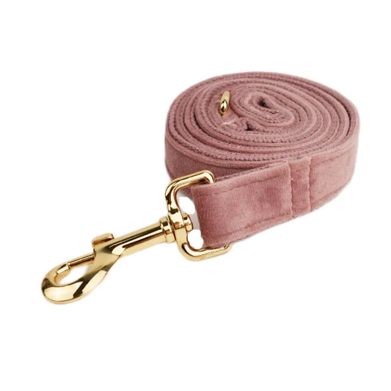 Light purple cloth dog collar set with various pet accessories including leash and vest components