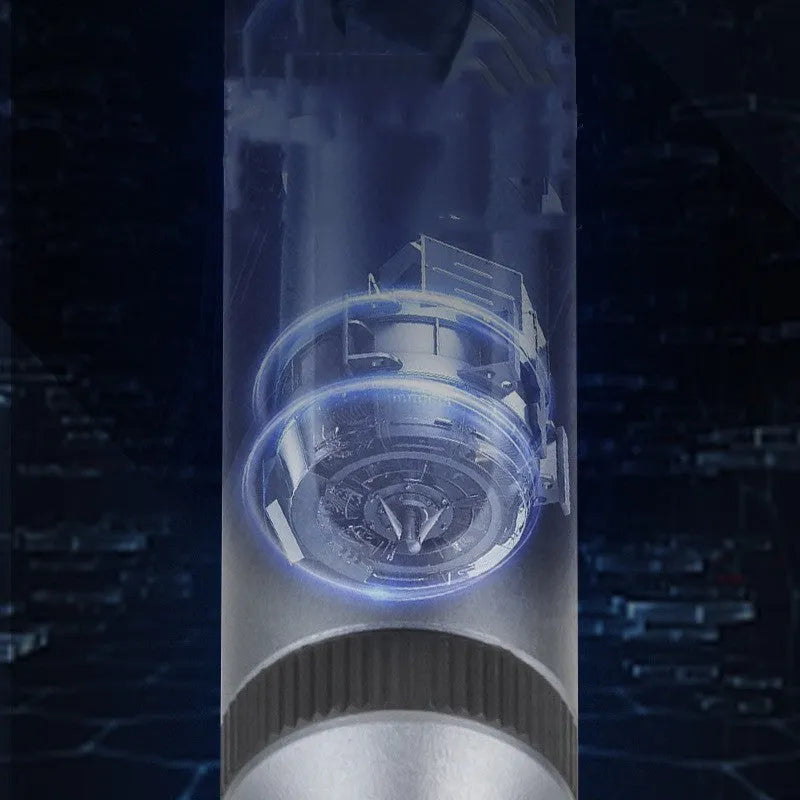 Compact aluminium electric screwdriver with bit holder, showing scale against a hand.