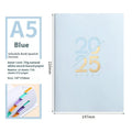A5 daily planner with soft faux leather cover open to show dot grid pages