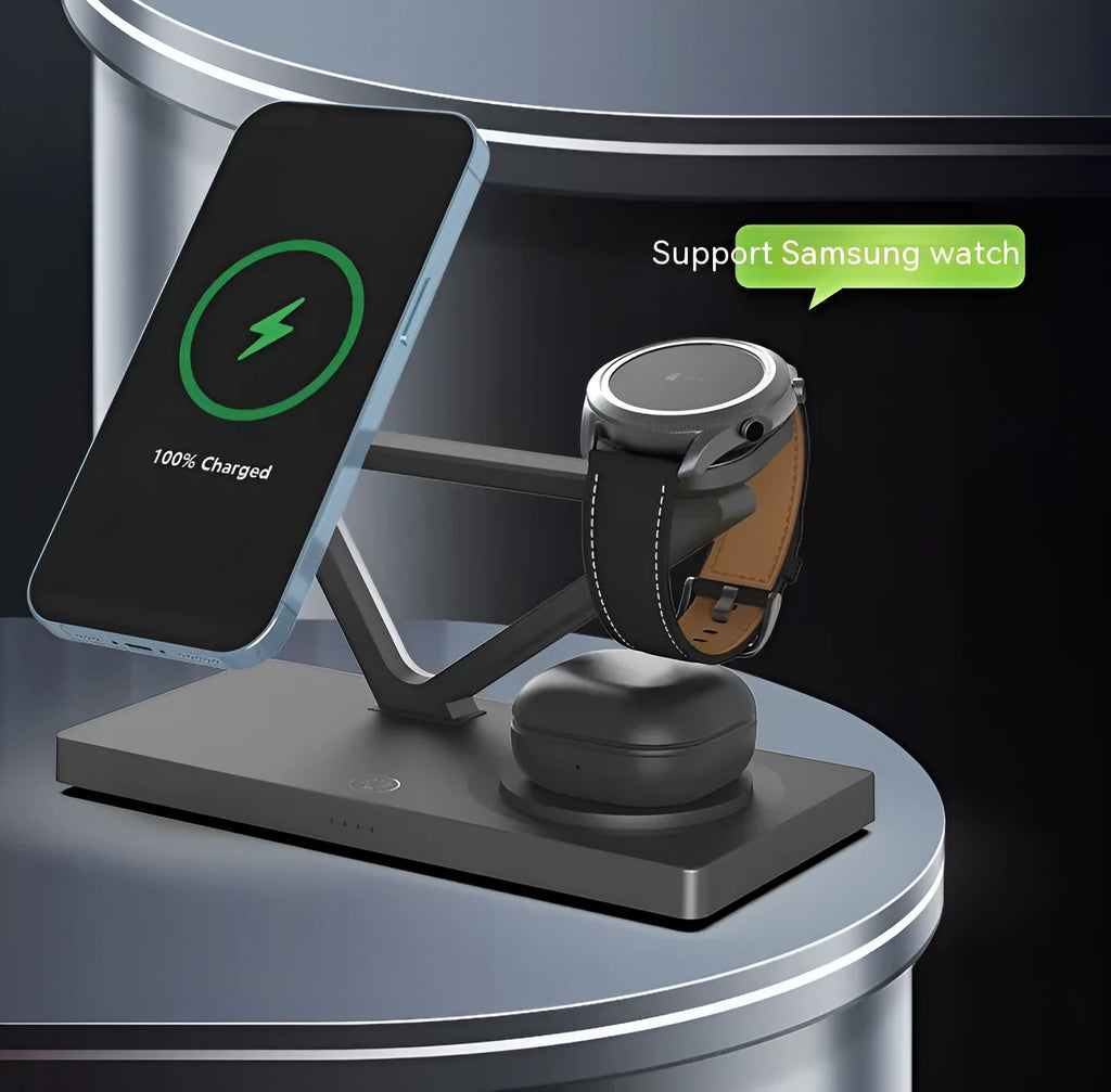 White 5-in-1 wireless charging station with magnetic phone holder, smartwatch pad, and glowing RGB night light on a wooden desk.
