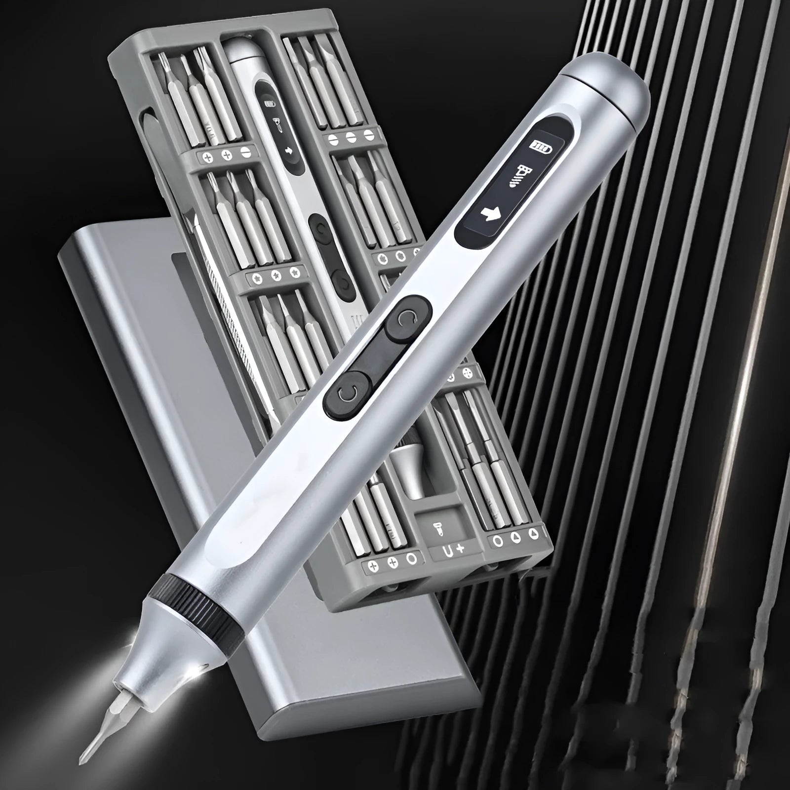 Compact aluminium electric screwdriver with bit holder, showing scale against a hand.