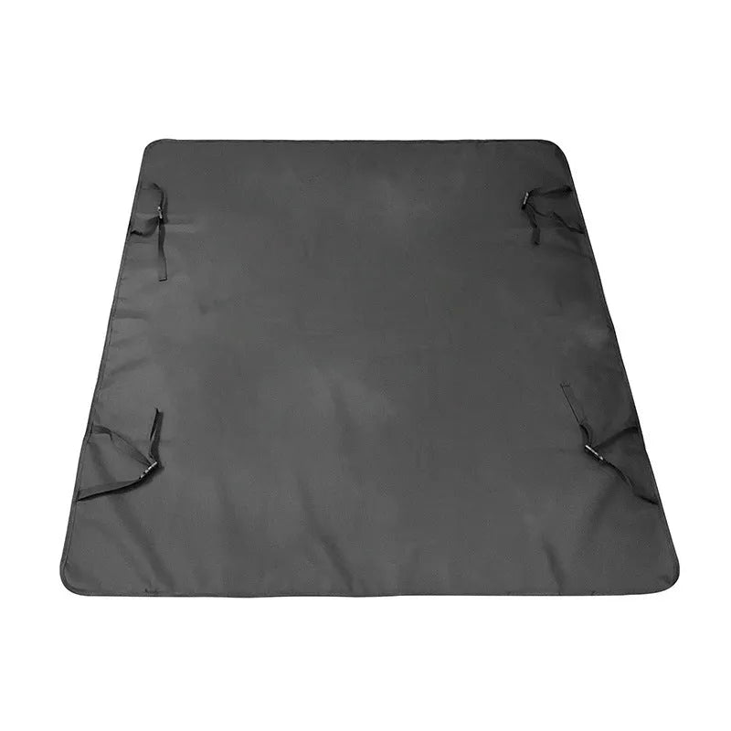 Grey cloth car pet mat with dog bone print protecting a car rear seat