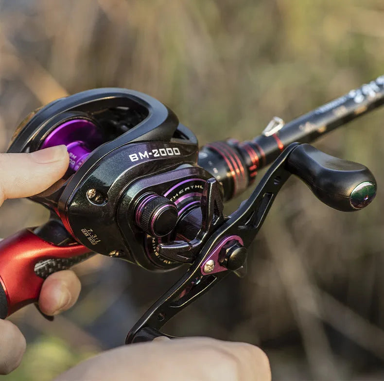 Colourful BM2000 fishing reel on a white background, showing left and right-hand retrieve options.